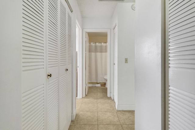 968 Sumter Rd W, West Palm Beach, FL 33415 - hall with light tile patterned floors
