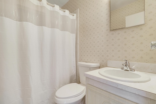 968 Sumter Rd W, West Palm Beach, FL 33415 - full bathroom featuring wallpapered walls, vanity, and curtained shower