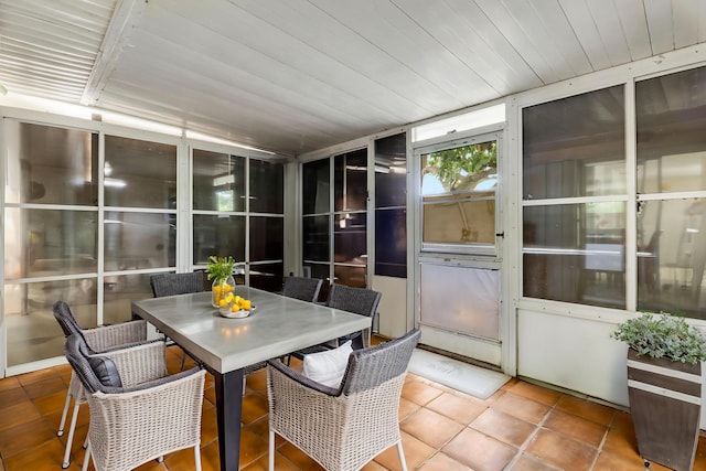 968 Sumter Rd W, West Palm Beach, FL 33415 - sunroom / solarium featuring outdoor dining space