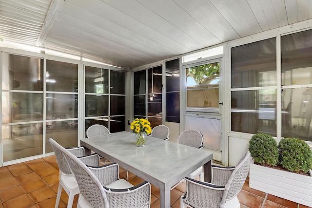 968 Sumter Rd W, West Palm Beach, FL 33415 - sunroom with outdoor dining space