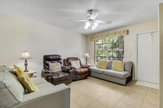 968 Sumter Rd W, West Palm Beach, FL 33415 - living area with light tile patterned floors, wallpapered walls, ceiling fan, and a textured ceiling