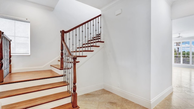 4917 Watersong Way, Fort Pierce, FL 34949 - staircase with crown molding and baseboards