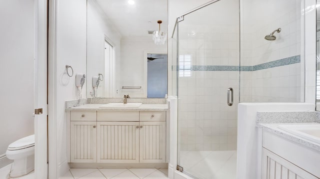 4917 Watersong Way, Fort Pierce, FL 34949 - full bathroom featuring vanity, a shower stall, crown molding, and tile patterned flooring