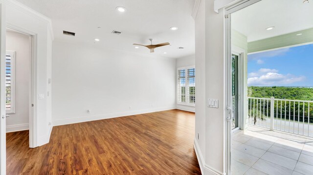 4917 Watersong Way, Fort Pierce, FL 34949 - empty room with wood finished floors, ceiling fan, and recessed lighting