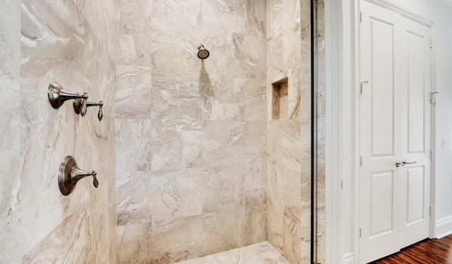 4917 Watersong Way, Fort Pierce, FL 34949 - bathroom with a tile shower and wood finished floors