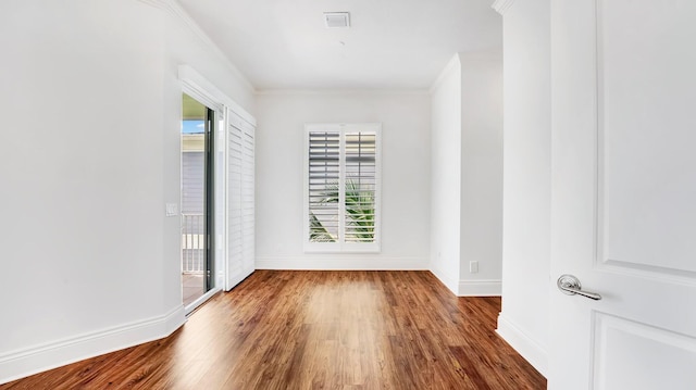 4917 Watersong Way, Fort Pierce, FL 34949 - unfurnished room featuring wood finished floors and ornamental molding