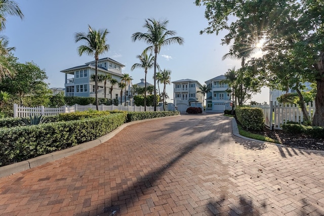 4917 Watersong Way, Fort Pierce, FL 34949 - view of front facade featuring a residential view and decorative driveway