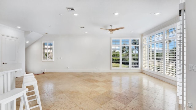 4917 Watersong Way, Fort Pierce, FL 34949 - spare room featuring plenty of natural light, ceiling fan, recessed lighting, and ornamental molding