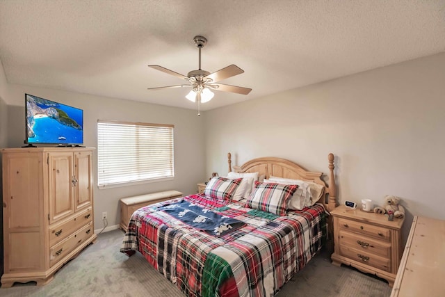 5900 S Golden Beauty Ln Unit 5900, Tamarac, FL 33321 - bedroom with light colored carpet, a textured ceiling, and a ceiling fan