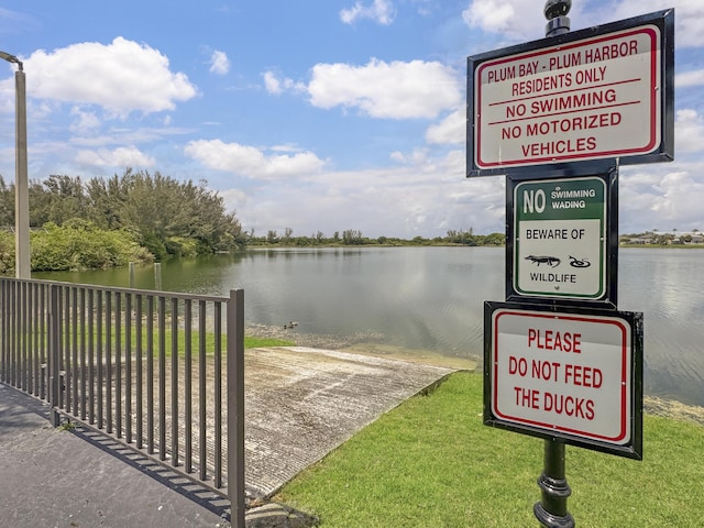 5900 S Golden Beauty Ln Unit 5900, Tamarac, FL 33321 - surrounding community featuring a water view