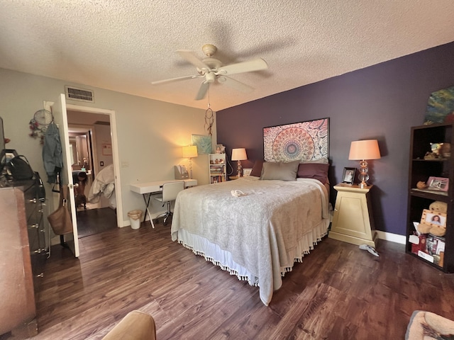 1535 Masters Cir Unit 148, Delray Beach, FL 33445 - bedroom with wood finished floors, a textured ceiling, and a ceiling fan