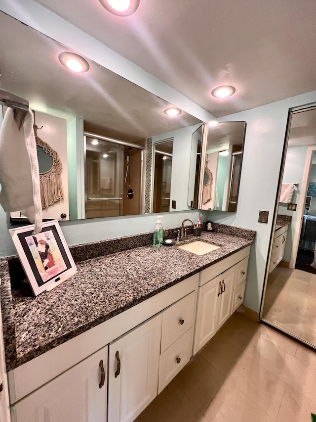 1535 Masters Cir Unit 148, Delray Beach, FL 33445 - full bath with vanity, a shower stall, and tile patterned floors
