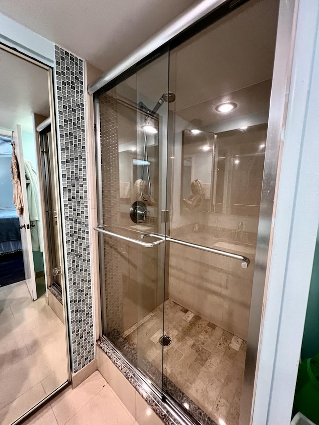 1535 Masters Cir Unit 148, Delray Beach, FL 33445 - ensuite bathroom with tile patterned flooring and a stall shower
