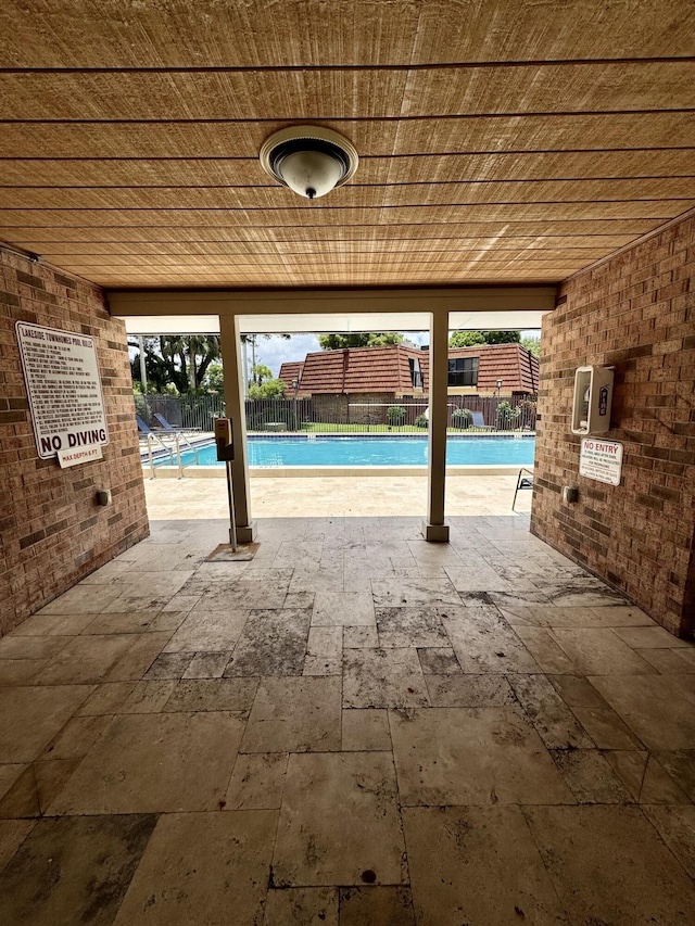1535 Masters Cir Unit 148, Delray Beach, FL 33445 - community pool featuring a patio area
