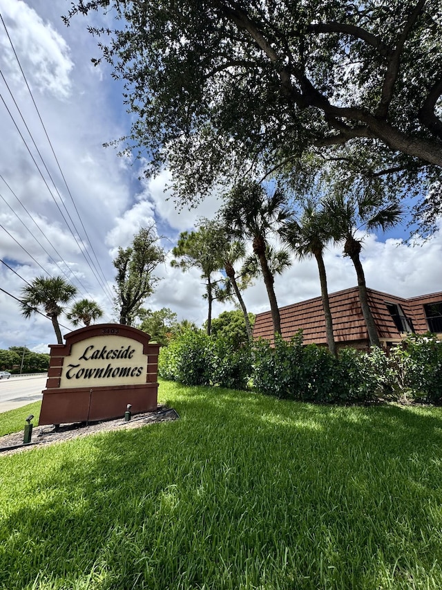 1535 Masters Cir Unit 148, Delray Beach, FL 33445 - community sign featuring a lawn