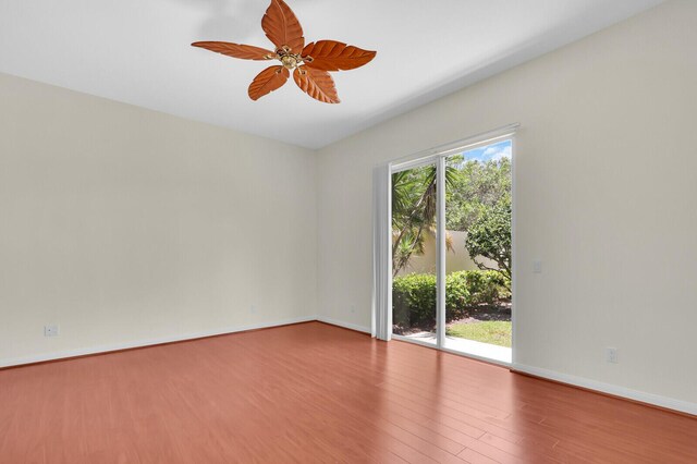 8851 Oldham Way, Palm Beach Gardens, FL 33412 - spare room with wood finished floors and ceiling fan