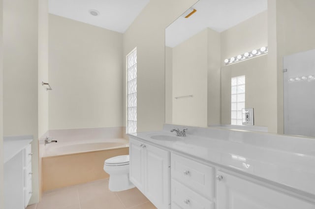 8851 Oldham Way, Palm Beach Gardens, FL 33412 - bathroom featuring vanity, a garden tub, and tile patterned floors