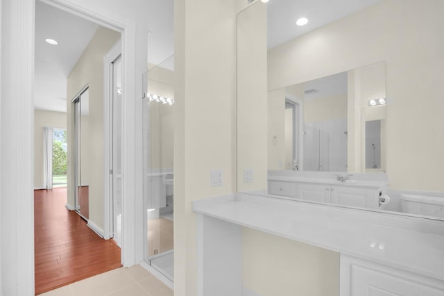 8851 Oldham Way, Palm Beach Gardens, FL 33412 - bathroom featuring a shower stall, vanity, and recessed lighting