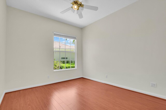 8851 Oldham Way, Palm Beach Gardens, FL 33412 - spare room with wood finished floors and ceiling fan