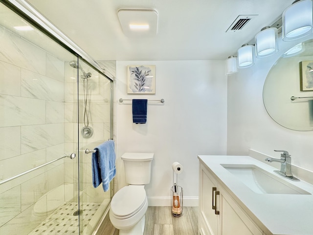 312 Knotty Pine Cir Unit C-1, Greenacres, FL 33463 - full bathroom with vanity, a stall shower, and wood finished floors