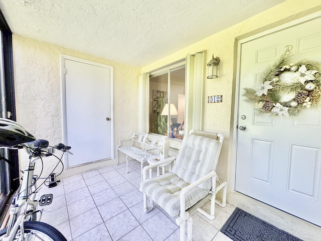 312 Knotty Pine Cir Unit C-1, Greenacres, FL 33463 - entrance to property featuring covered porch and stucco siding