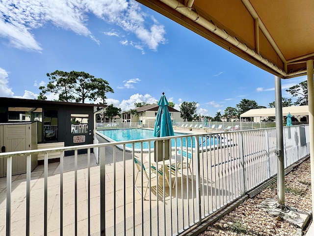 312 Knotty Pine Cir Unit C-1, Greenacres, FL 33463 - community pool featuring a patio