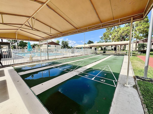 312 Knotty Pine Cir Unit C-1, Greenacres, FL 33463 - view of home's community featuring a pool and shuffleboard