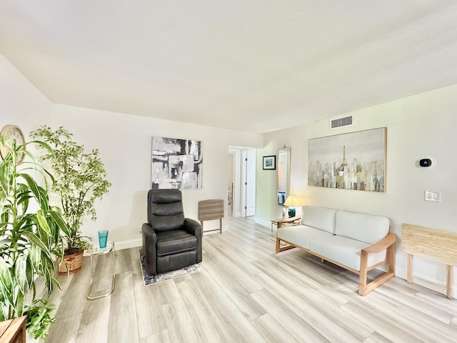 312 Knotty Pine Cir Unit C-1, Greenacres, FL 33463 - living area featuring wood finished floors and baseboards