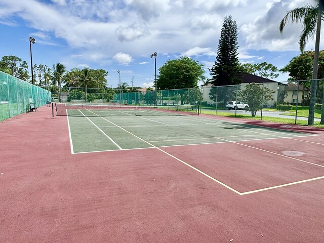312 Knotty Pine Cir Unit C-1, Greenacres, FL 33463 - view of tennis court with community basketball court