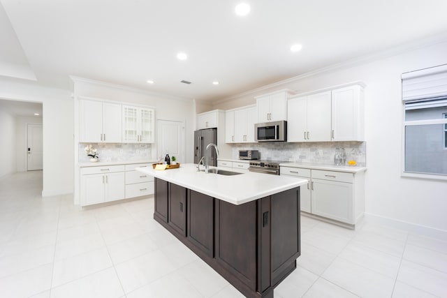 2571 SW Berry Park Cir, Palm City, FL 34990 - kitchen featuring appliances with stainless steel finishes, backsplash, light countertops, white cabinets, and recessed lighting