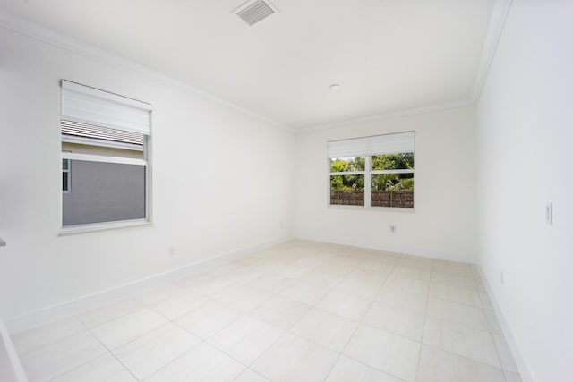 2571 SW Berry Park Cir, Palm City, FL 34990 - spare room with crown molding and light tile patterned floors