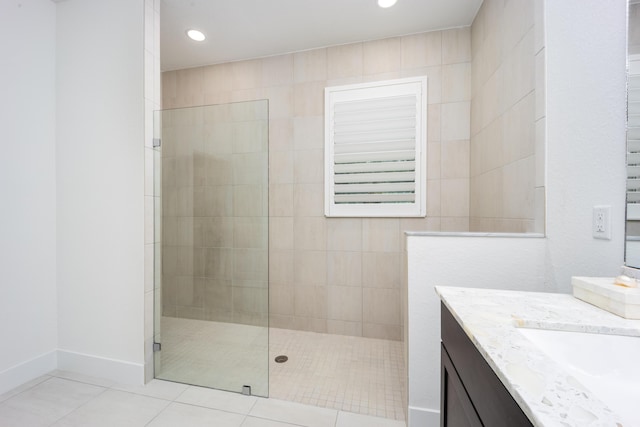 2571 SW Berry Park Cir, Palm City, FL 34990 - full bath featuring vanity, a walk in shower, tile patterned flooring, and recessed lighting