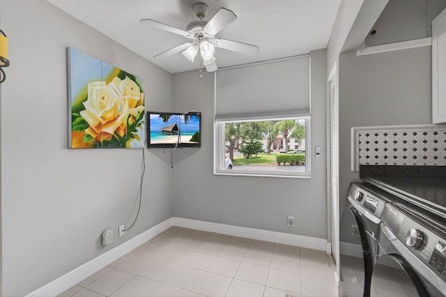 16 Willowbrook Ln Unit 102, Delray Beach, FL 33446 - washroom with separate washer and dryer, ceiling fan, and light tile patterned flooring