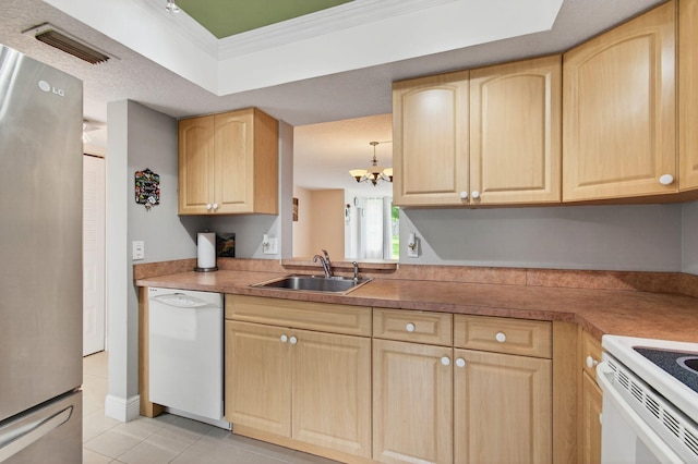 16 Willowbrook Ln Unit 102, Delray Beach, FL 33446 - kitchen featuring white dishwasher, light brown cabinetry, freestanding refrigerator, light tile patterned floors, and crown molding