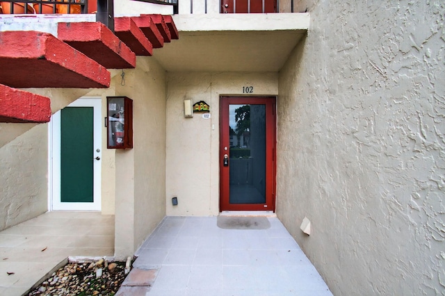 16 Willowbrook Ln Unit 102, Delray Beach, FL 33446 - entrance to property with stucco siding