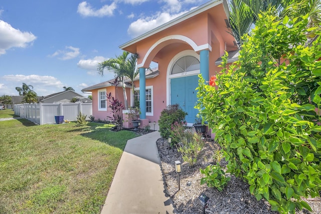 3982 SW Kabane St, Port Saint Lucie, FL 34953 - entrance to property featuring stucco siding