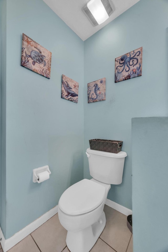 3982 SW Kabane St, Port Saint Lucie, FL 34953 - bathroom featuring toilet and tile patterned flooring
