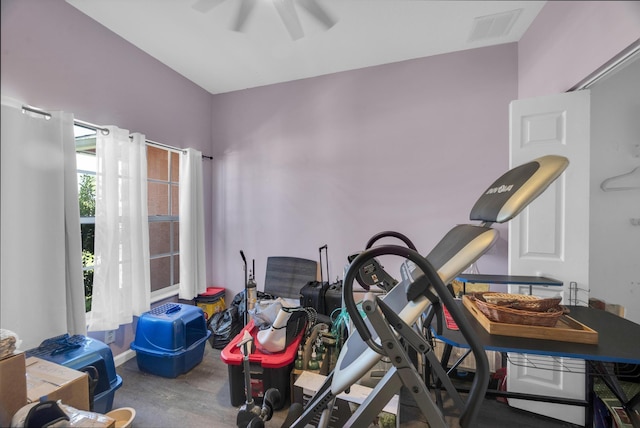 3982 SW Kabane St, Port Saint Lucie, FL 34953 - workout room with wood finished floors and a ceiling fan