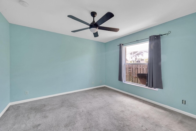 3982 SW Kabane St, Port Saint Lucie, FL 34953 - empty room featuring carpet, ceiling fan, and a smoke detector