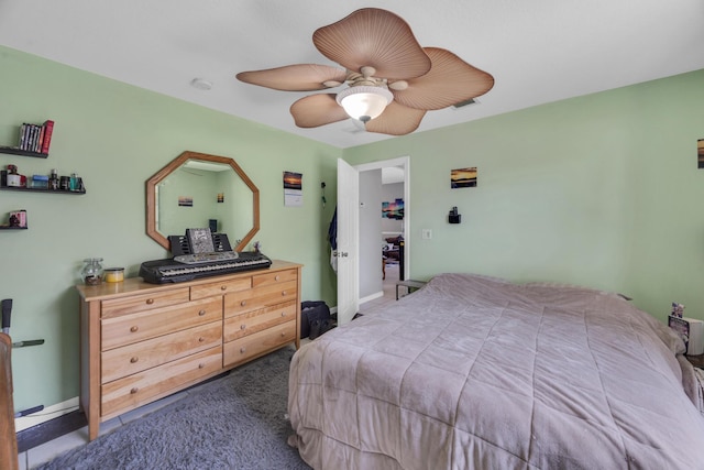 3982 SW Kabane St, Port Saint Lucie, FL 34953 - carpeted bedroom with a ceiling fan and baseboards