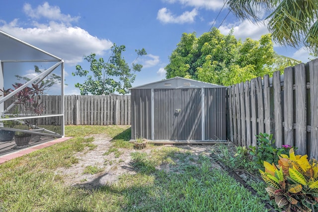 3982 SW Kabane St, Port Saint Lucie, FL 34953 - fenced backyard featuring a storage unit