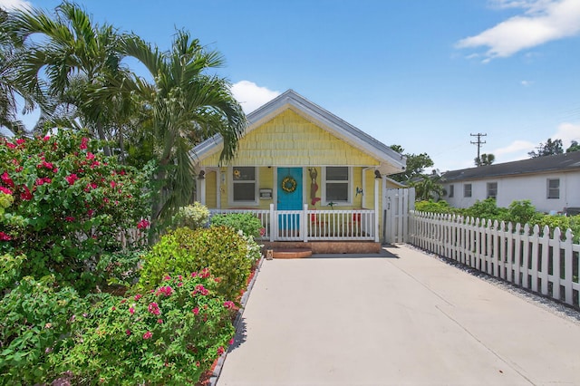 406 N D St, Lake Worth Beach, FL 33460 - view of front facade featuring a porch