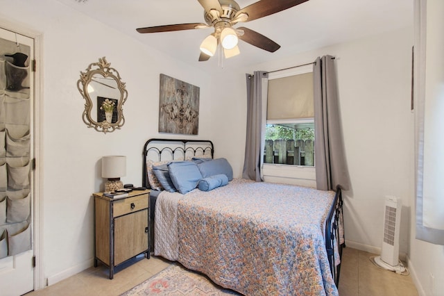 406 N D St, Lake Worth Beach, FL 33460 - bedroom featuring light tile patterned flooring and ceiling fan