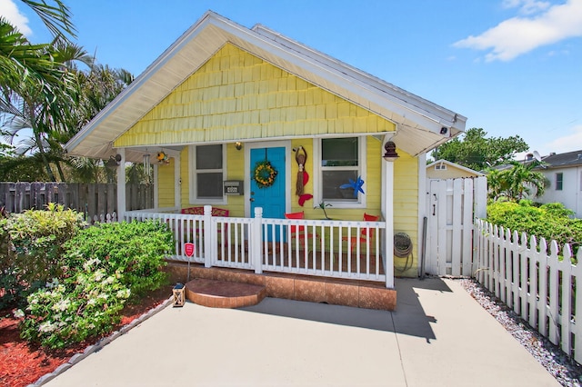 406 N D St, Lake Worth Beach, FL 33460 - view of front of home featuring covered porch
