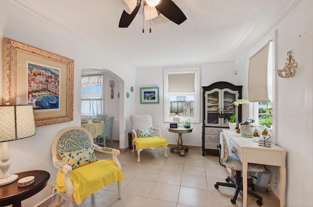 406 N D St, Lake Worth Beach, FL 33460 - tiled office space with arched walkways, ceiling fan, and a textured ceiling