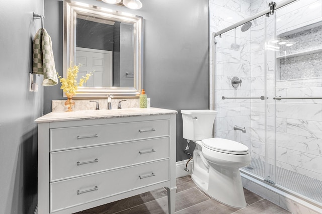 5783 NW 48th Ct, Coral Springs, FL 33067 - full bath with vanity, a stall shower, and wood finish floors