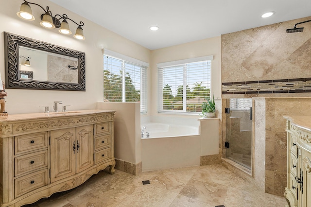 5783 NW 48th Ct, Coral Springs, FL 33067 - full bath featuring a shower stall, vanity, a garden tub, and recessed lighting