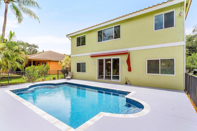 5783 NW 48th Ct, Coral Springs, FL 33067 - view of swimming pool with a patio area