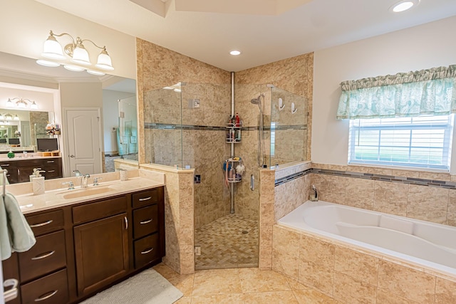 5927 NW Favian Ave, Port Saint Lucie, FL 34986 - full bath with a stall shower, a garden tub, vanity, tile patterned flooring, and recessed lighting