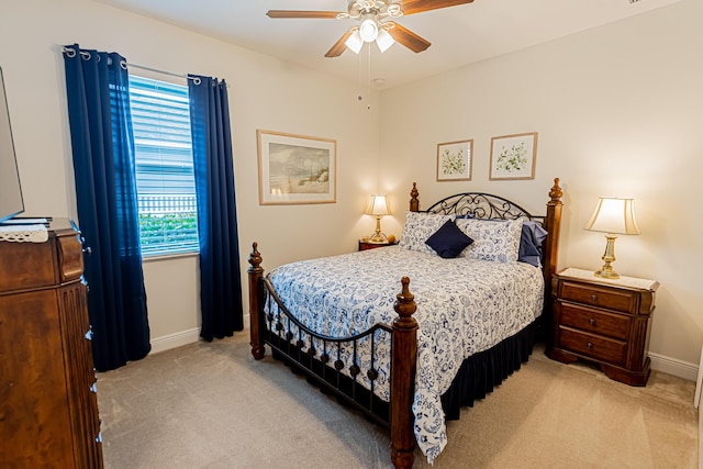 5927 NW Favian Ave, Port Saint Lucie, FL 34986 - bedroom with light carpet and ceiling fan